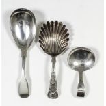 A George III plain silver fiddle pattern caddy spoon with oval bowl by George Nangle, Dublin 1810 (