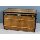 A large 19th Century Louis Vuitton cabin trunk, 40.5ins x 22.75ins x 23.75ins, the ends with