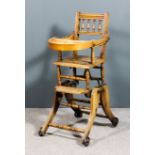 A Victorian child's stained beechwood metamorphic high chair with turned spindles to back and on