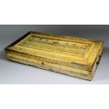 An Anglo-Indian Visagapatam ivory rectangular work box decorated with a walled palace, within floral