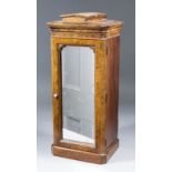 A Victorian walnut miniature single wardrobe with shaped and moulded pediment, interior fitted