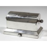 An Edward VII Asprey patent silver dome top double stamp roll dispenser and moistener with central
