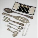 A Victorian silver dessert spoon and fork, the shaped handle engraved with lozenge ornament, by