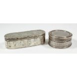 A Dutch silvery metal oblong box the whole die stamped with various figures in landscapes within