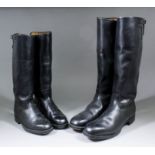 A pair of full length black leather boots, the interior stamped "FORI" and "67", and another pair