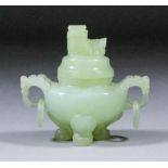 A Chinese jade two handled censor, the lid surmounted by a dog of Fo, 3.5ins wide x 3ins high