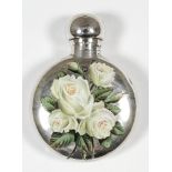 A late Victorian silver and enamelled circular scent bottle with flattened sides, the front