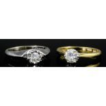 A modern 18ct gold and platinum mounted diamond solitaire ring, the brilliant cut stone of .50ct, (