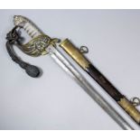 An English 1897 pattern Naval Officers dress sword by Friedberg of Portsea, the bright steel blade