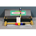 A Jaques croquet set and box for same, 42ins x 9.5ins x 6ins high