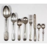 Four Victorian silver fiddle pattern tablespoons by Henry Holland, London 1866, two matching dessert