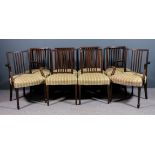 A set of eight mahogany square back dining chairs of "Hepplewhite" design (including two armchairs),