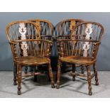 A set of four 19th Century "Nottinghamshire" ash and elm seated low back Windsor armchairs, the