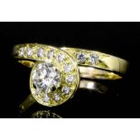 A modern Grima 18ct gold all diamond set ring, the central brilliant cut diamond of approximately .