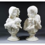 A pair of late 19th Century Italian carved alabaster busts of a young girl holding a puppy and a boy