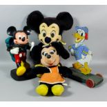 Four items of Walt Disney interest, comprising - a Mickey Mouse soft toy manufactured by