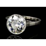 An Edwardian 15ct white gold mounted diamond solitaire, the old cut stone of approximately 1.6ct (