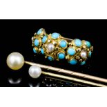 A late Victorian gold coloured metal mounted seed pearl and turquoise set ring, the face with