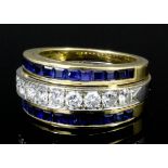 A modern 18ct white and yellow gold mounted sapphire and diamond set triple band ring, the central