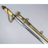 An English ceremonial sword from The Order of Odd Fellows, with bright steel blade, brass scabbard