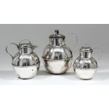 Two late Victorian silver Jersey pattern milk cans, 7ins and 5ins high, by William Griffiths & Sons,