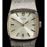 A 1960's lady's Tudor 9ct gold cased wristwatch, the rectangular gilt face with baton numerals,