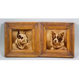 A pair of Victorian Sherwin & Cotton pottery tiles moulded in relief with a Bull Terrier, and