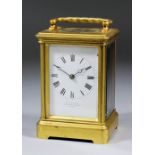 A late 19th Century French carriage timepiece by J.W. Benson, No.19328. the white enamel dial with