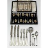A set of six Victorian silver fruit knives and six fruit forks with engraved blades and carved