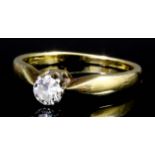 A modern 9ct gold mounted diamond solitaire ring, the brilliant cut stone of approximately .33ct (