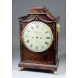 A George IV mahogany mantel clock by G. Yonge & Son, London, with 8ins diameter painted metal dial