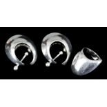 A pair of modern Georg Jensen silver earrings of curved abstract form (with clip fittings) and