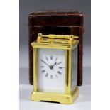 A late 19th Century French carriage clock by E.G.L of Paris, No.3555, the white enamel dial with