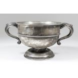 A George V silver two-handled circular rose bowl with moulded rim and girdle and leaf capped