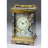 A late 19th/early 20th Century French carriage clock, the 2ins diameter cream enamel dial with