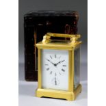 A late 19th Century French miniature carriage timepiece with alarum, the white enamel dial with