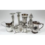 A George V silver sugar castor with scroll mounts to body, on circular footrim, 6.5ins high,
