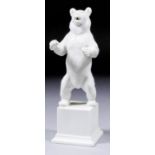 A rare SS Allach white porcelain figure of a standing bear modelled by Franz Nagy, on square stepped