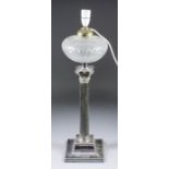 A plated table oil lamp of Corinthian column form, on stepped square base with bead mounts and