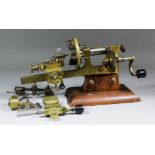 A 19th Century Watchmakers brass and steel lathe or mandrel, the hand with cranked action with