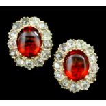 A pair of modern gold coloured metal mounted fire opal and diamond set earrings (for pierced