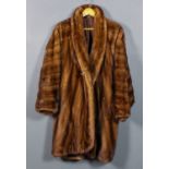 A 1980's Fendi brown ranch mink three-quarter length jacket with brown silk lining, length 40ins,