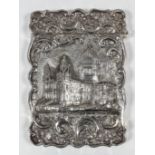 A Victorian silver rectangular "Castle Top" card case of shaped outline, the front cast with