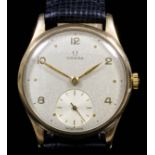 A late 1940s Omega gentleman's 9ct gold cased wristwatch, the champagne finished dial with Arabic