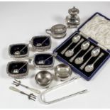 A set of four late Victorian silver rectangular salts with bead mounts, part reeded and fluted