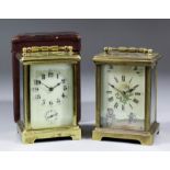 Two early 20th Century French carriage timepieces, one with alarum and cream enamel dial with Arabic