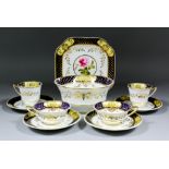 An early 19th Century English bone china part tea service enamelled in colours with full blown