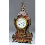 A late 19th Century French red tortoiseshell Boulle and gilt brass mounted mantle clock by Maple and