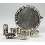 A George II Scottish silver circular waiter with shaped and moulded rim, on three hoof pattern