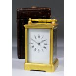 A late 19th Century French carriage clock, No.2394, the white enamel dial with Roman and Arabic